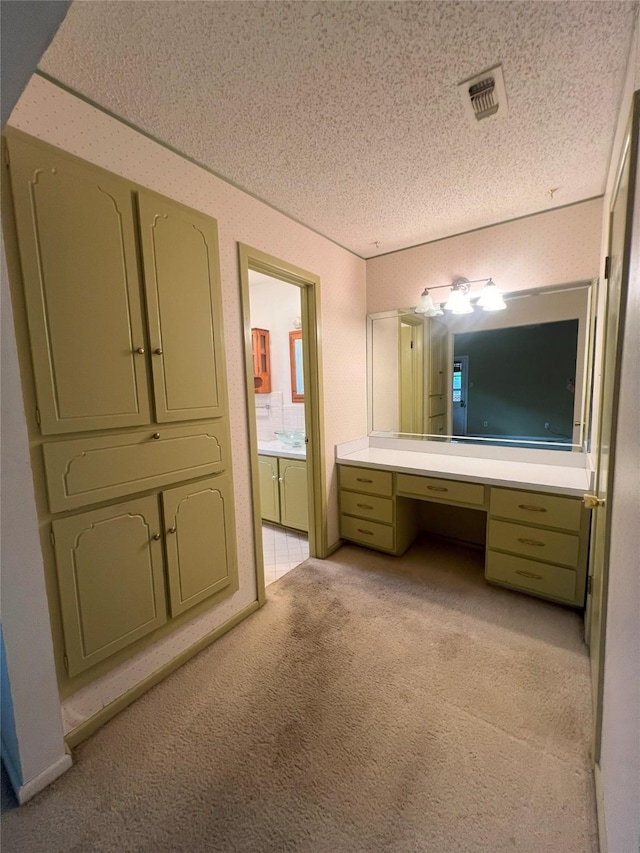 bathroom with a textured ceiling