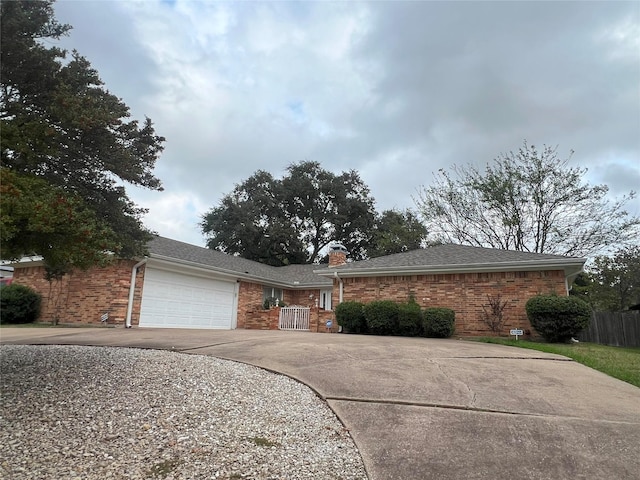 single story home featuring a garage