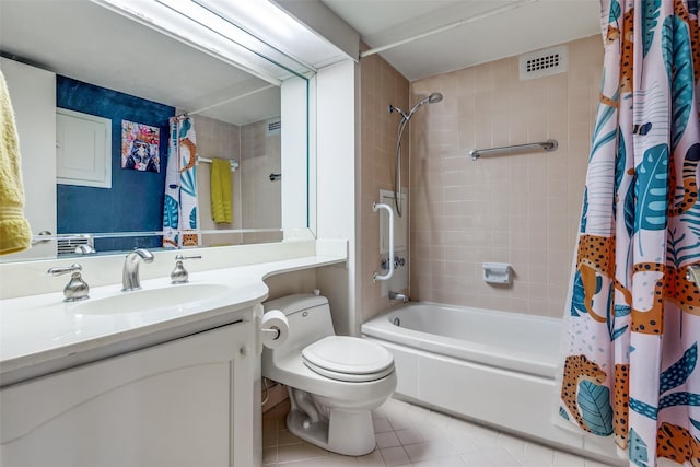 full bathroom with toilet, vanity, tile patterned floors, and shower / bath combo with shower curtain