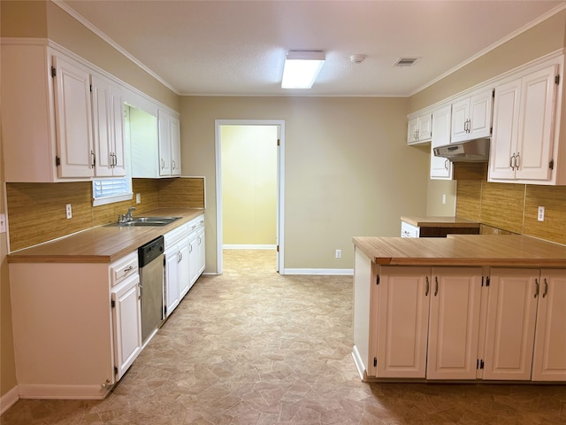 kitchen featuring sink, crown molding, dishwasher, white cabinets, and backsplash