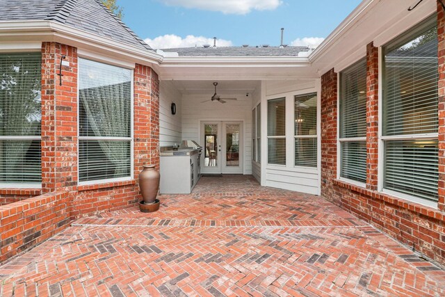 view of patio featuring french doors and a ceiling fan