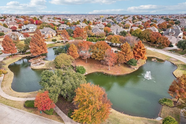 aerial view with a residential view and a water view