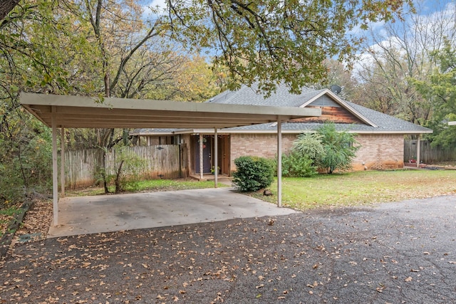 view of car parking featuring a carport