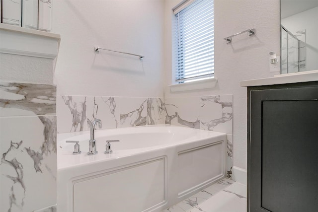 bathroom featuring separate shower and tub