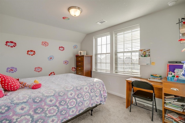 carpeted bedroom featuring lofted ceiling