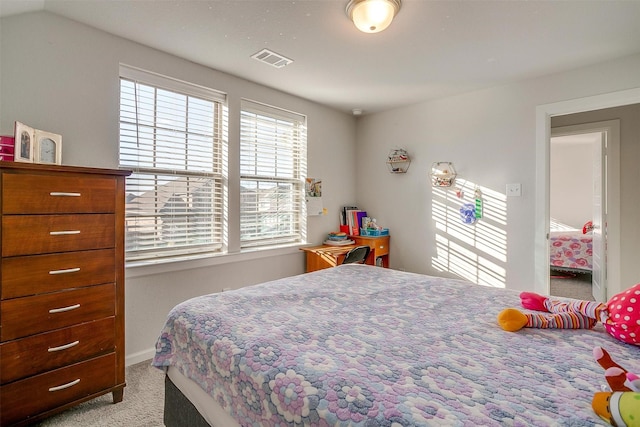 bedroom with light carpet