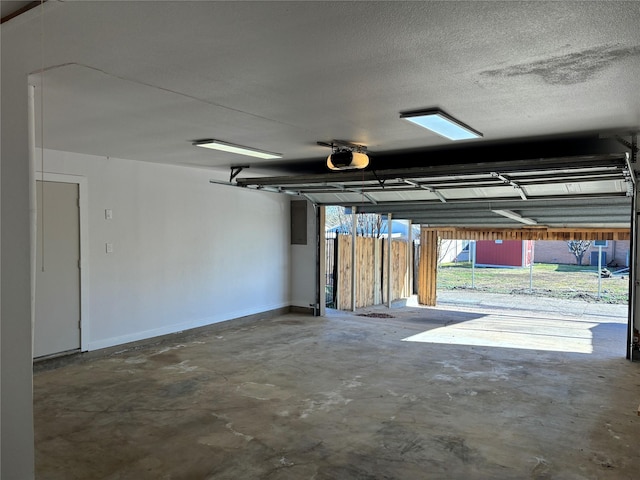 garage featuring a garage door opener