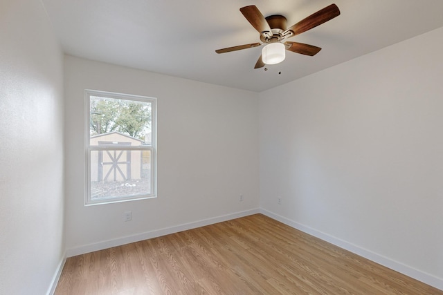 unfurnished room featuring ceiling fan and light hardwood / wood-style flooring