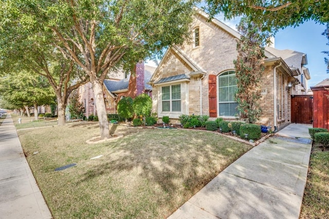 view of property with a front lawn