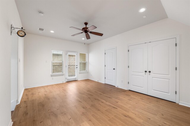 unfurnished bedroom featuring ceiling fan and light wood-type flooring