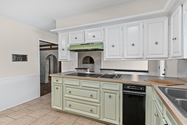 kitchen with white cabinets, stainless steel gas stovetop, and ornamental molding