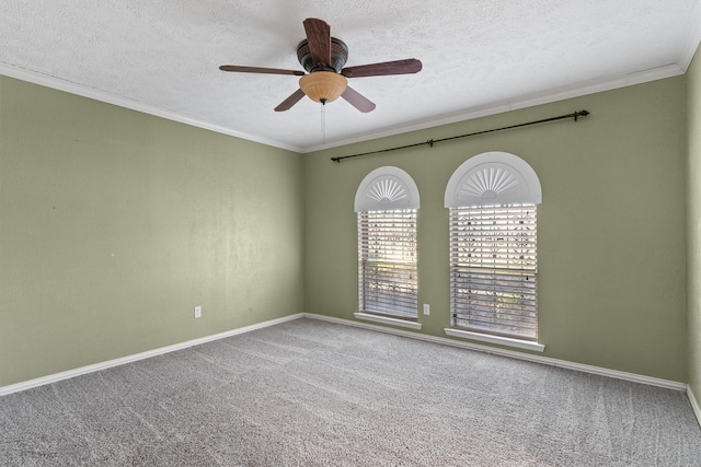 unfurnished room featuring ceiling fan, carpet floors, and a textured ceiling