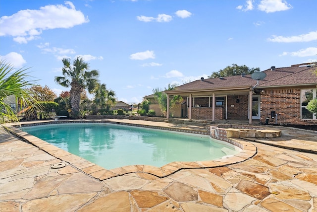 view of pool featuring a patio