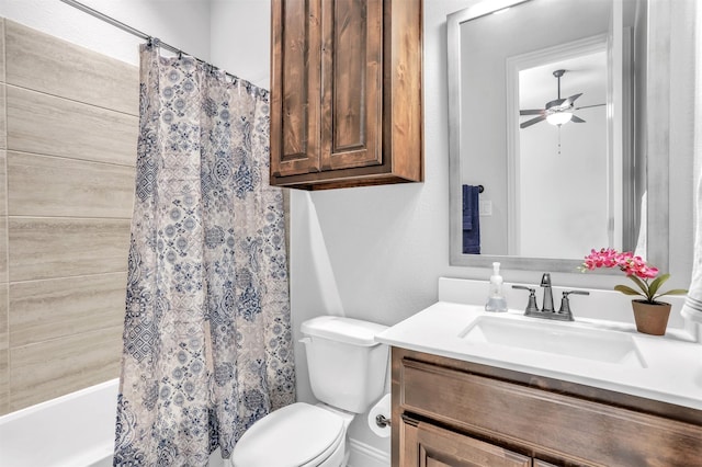 bathroom featuring vanity, ceiling fan, and toilet