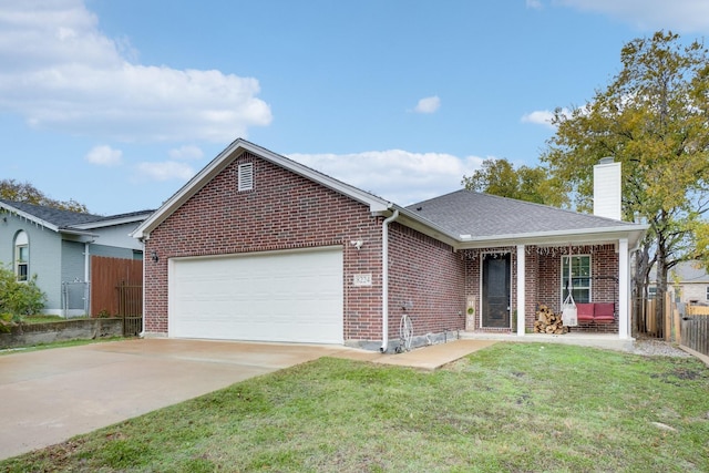 single story home featuring a garage and a front lawn