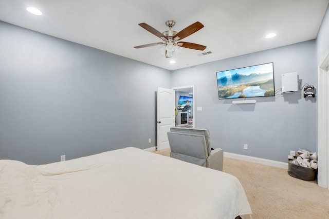 carpeted bedroom featuring ceiling fan