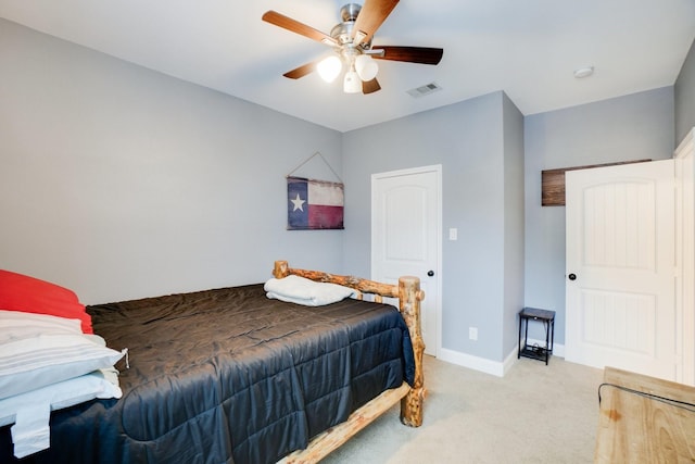 carpeted bedroom with ceiling fan