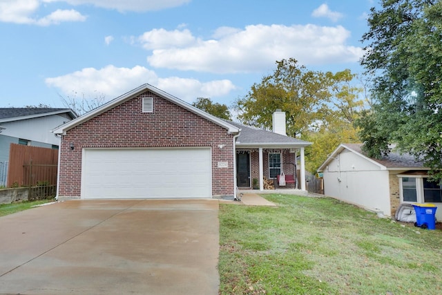 single story home featuring a front lawn and a garage