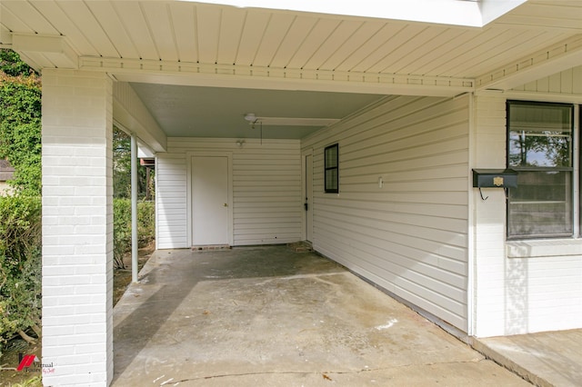 view of patio / terrace with a carport