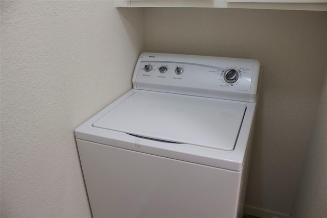 laundry area with washer / dryer