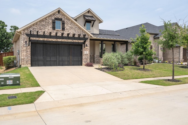 view of front facade featuring a front yard and a garage