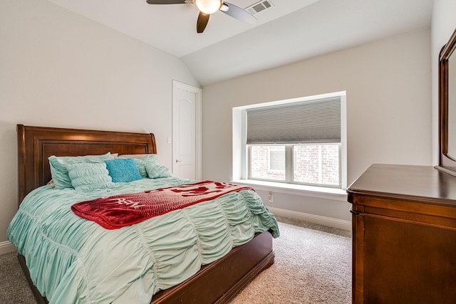 bedroom featuring ceiling fan, carpet, and lofted ceiling