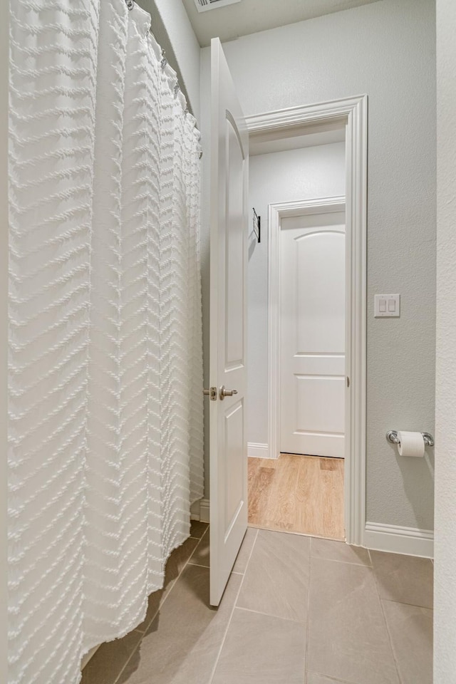 bathroom featuring tile patterned floors