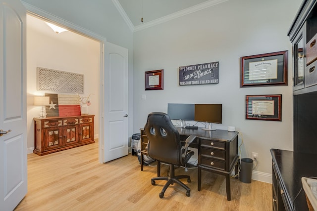 home office with light wood-type flooring, vaulted ceiling, and crown molding