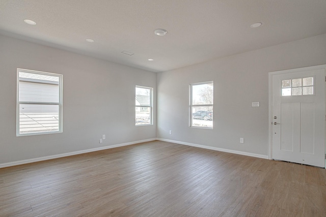 foyer with light hardwood / wood-style flooring