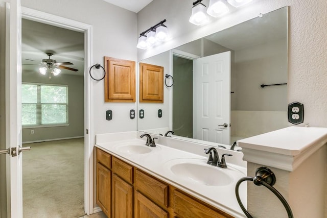 bathroom with vanity and ceiling fan