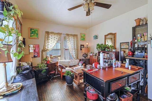 office with dark hardwood / wood-style floors and ceiling fan