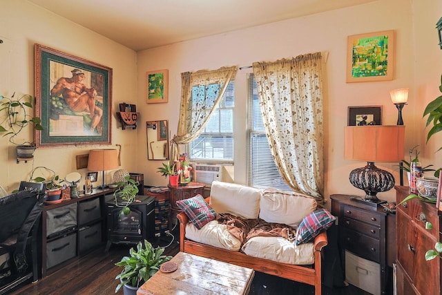 sitting room with dark hardwood / wood-style floors