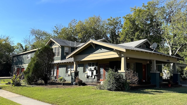 view of front of house with a front lawn and a porch