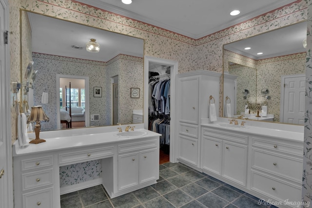 bathroom featuring vanity and ornamental molding