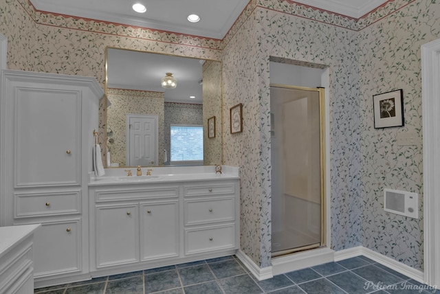 bathroom with tile patterned flooring, crown molding, an enclosed shower, and vanity