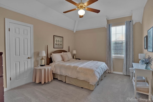 bedroom with ceiling fan, ornamental molding, light carpet, and vaulted ceiling