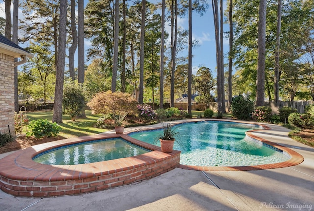 9622 Norris Ferry Rd, Shreveport, LA 71106 - view of pool with a fenced backyard, a pool with connected hot tub, and a patio area