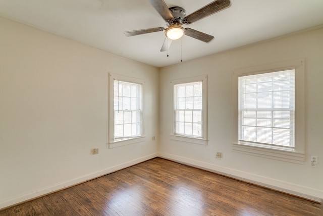 unfurnished room with ceiling fan and wood-type flooring