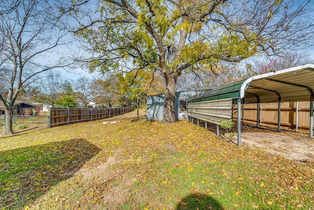 view of yard with a carport