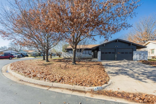 ranch-style home with a garage