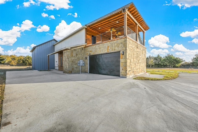 view of side of property featuring a garage