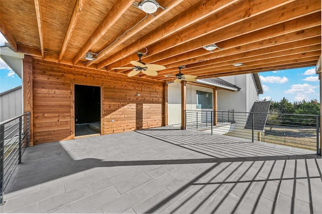 exterior space with ceiling fan