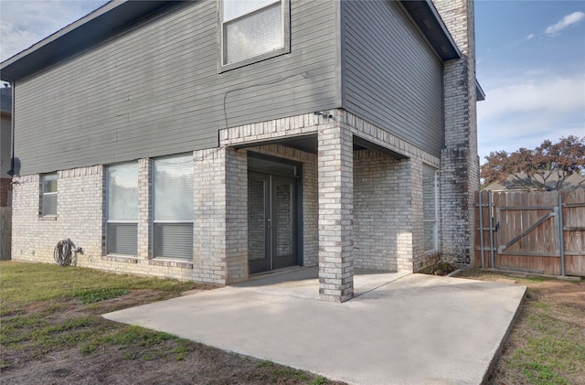 back of property with a patio area