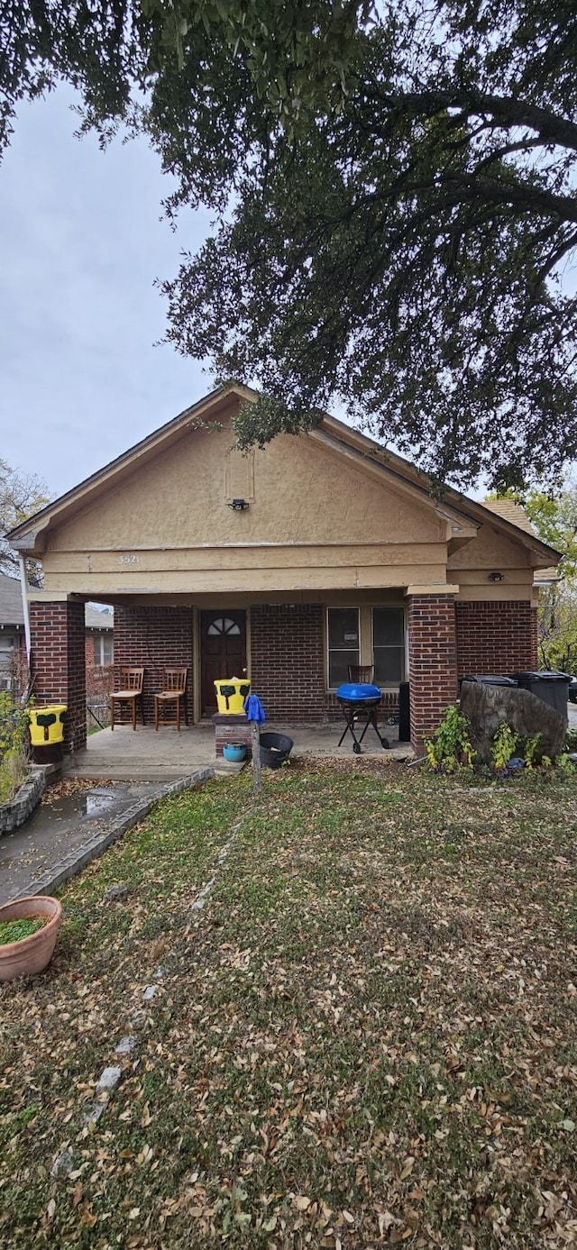 rear view of house featuring a patio area