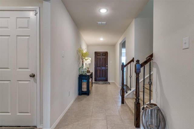 entrance foyer with light tile patterned flooring