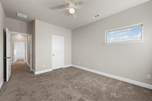 unfurnished bedroom with carpet flooring and ceiling fan