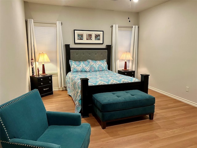 bedroom with light wood-type flooring