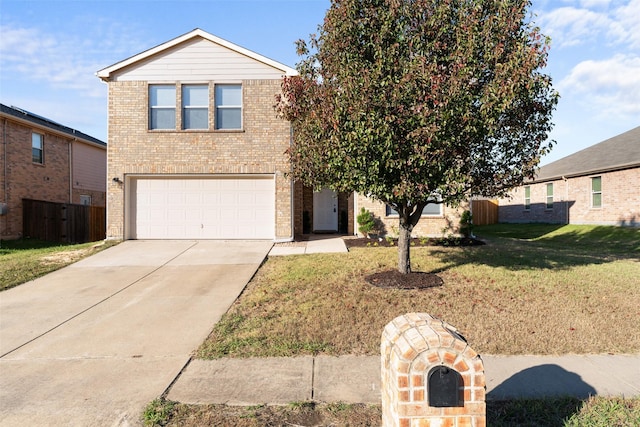 view of front property featuring a garage and a front lawn