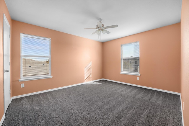 carpeted empty room with ceiling fan