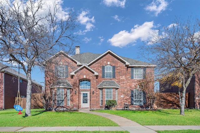 view of front facade with a front yard